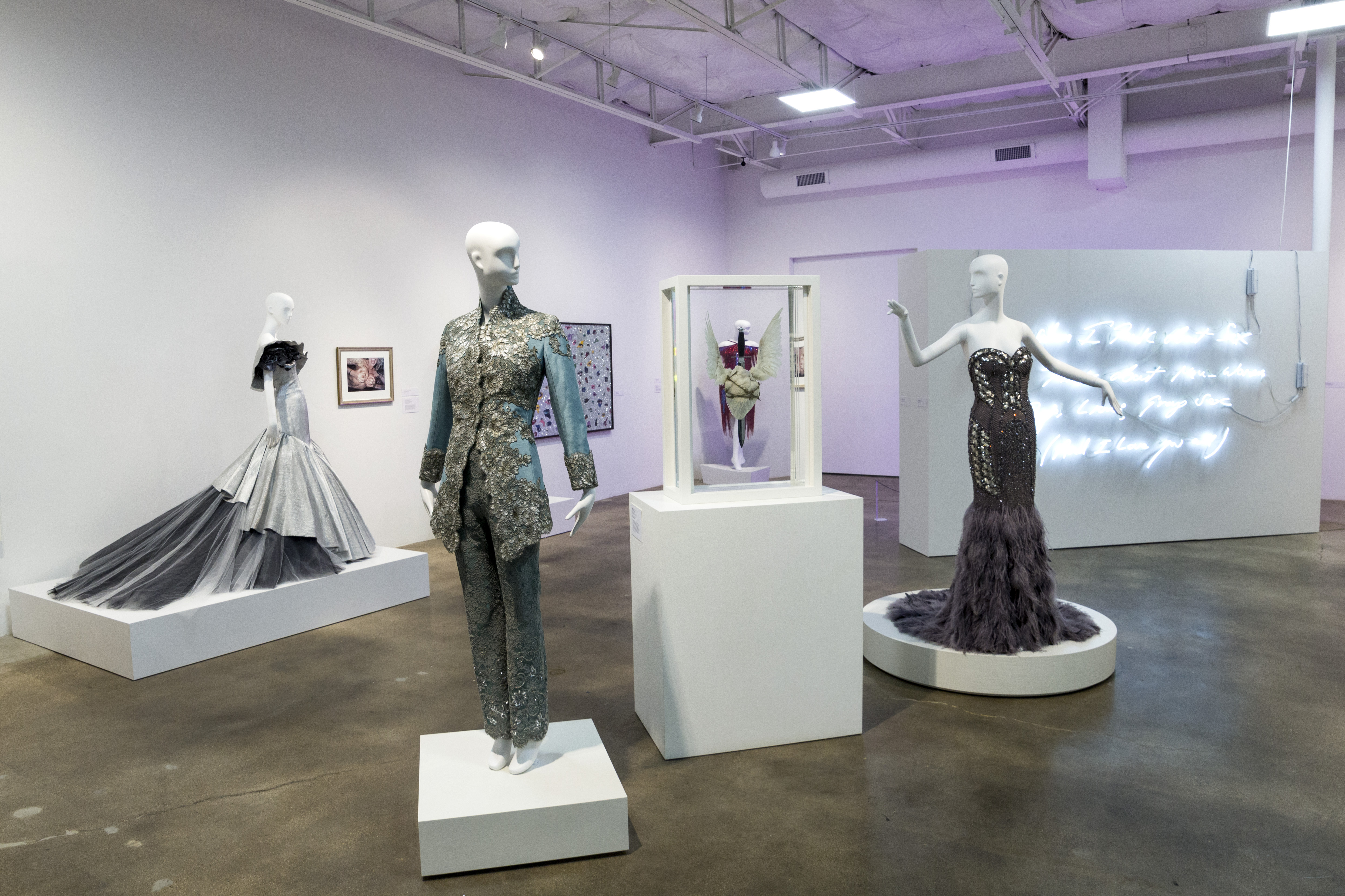 The University of North Texas’ Texas Fashion Collection is part of the exhibition “On Bodies: Highlights from The Goss-Michael Foundation and the UNT Texas Fashion Collection,” that forms a link between high fashion and British art. It will run through Feb. 2 (Friday), 2018 at the Goss-Michael Foundation, 1305 Wycliff Ave #120 in Dallas. It features garments by Zac Posen, John Galliano for Givenchy and Escada shown with artworks by Damien Hirst and Tracey Emin. Photo by Abigail Firth.